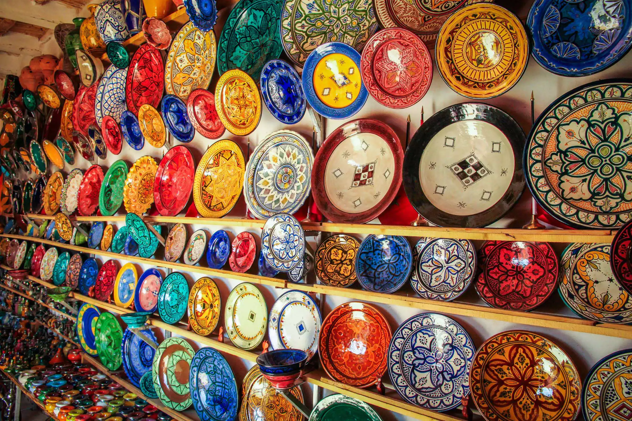 A shop with diverse Moroccan pottery on a display